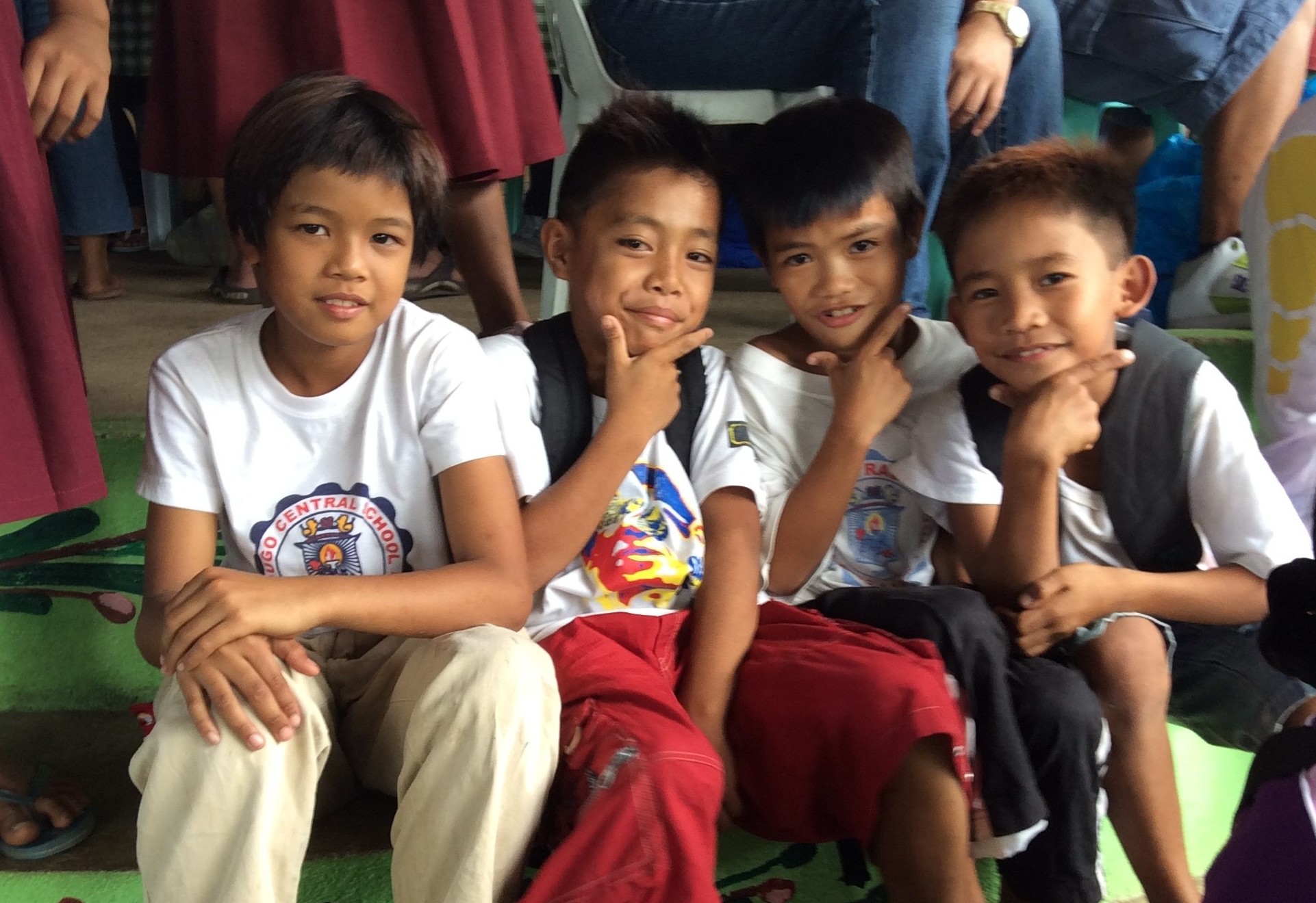 School boys enjoying their new supplies.